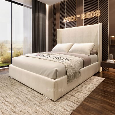 Elegant Yukon Wingback Bed Frame in cream, with minimalist headboard and chrome feet, designed for standard UK mattresses.
