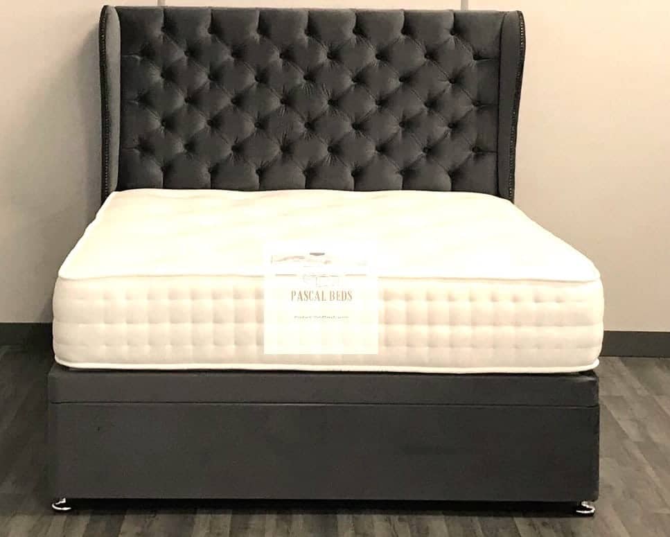 2024 Oxford Optional Storage Drawer Bed featuring discreet storage drawers and luxurious upholstered headboard in an elegant bedroom setting